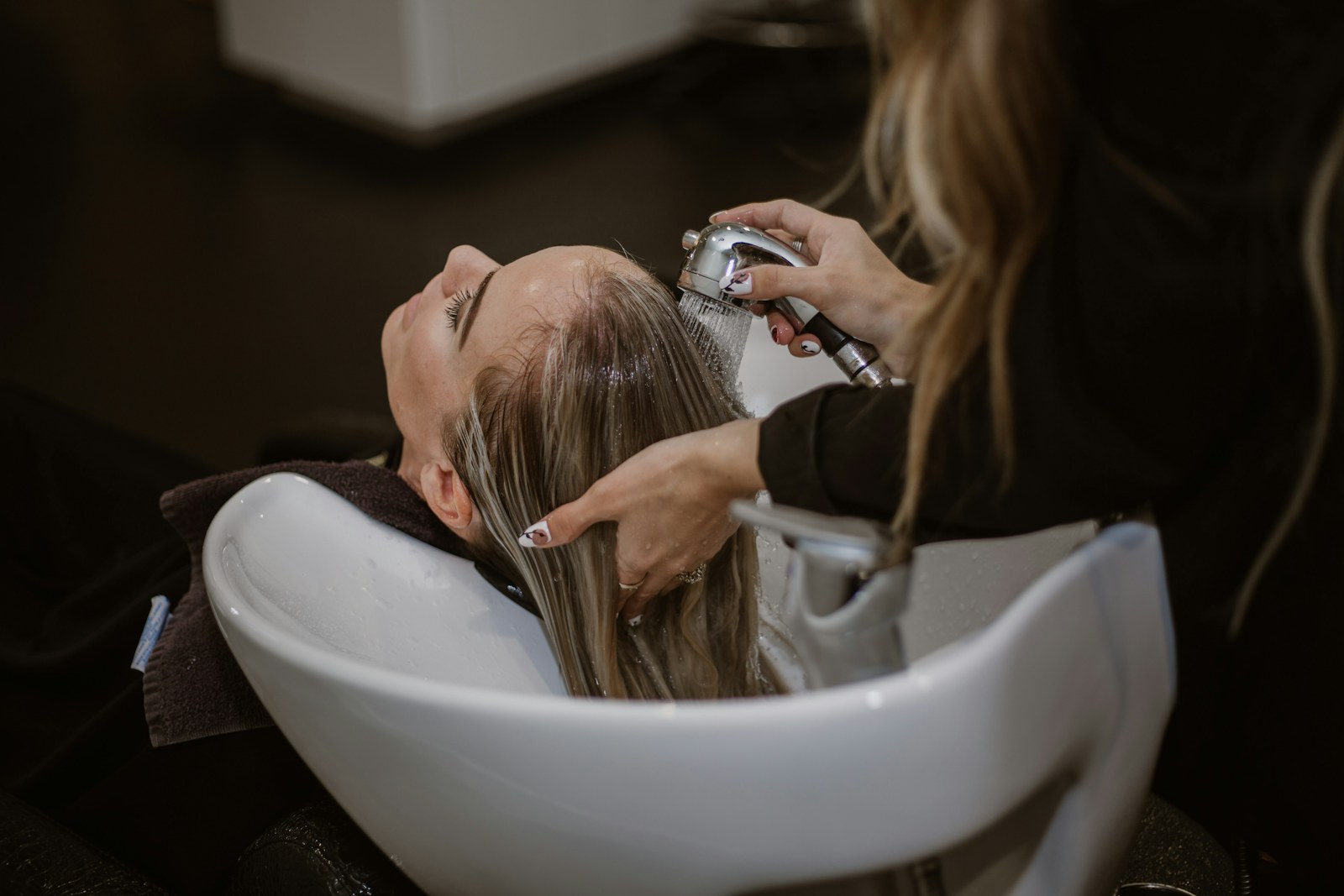Professional conditioning treatment applied to wet hair